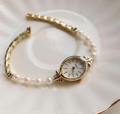 Montre à quartz pour femme, bracelet en perles d'eau douce naturelles